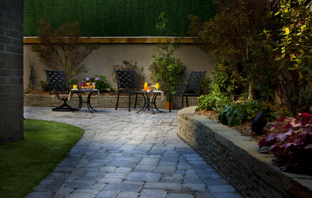 The Aura Hotel garden patio and services area
